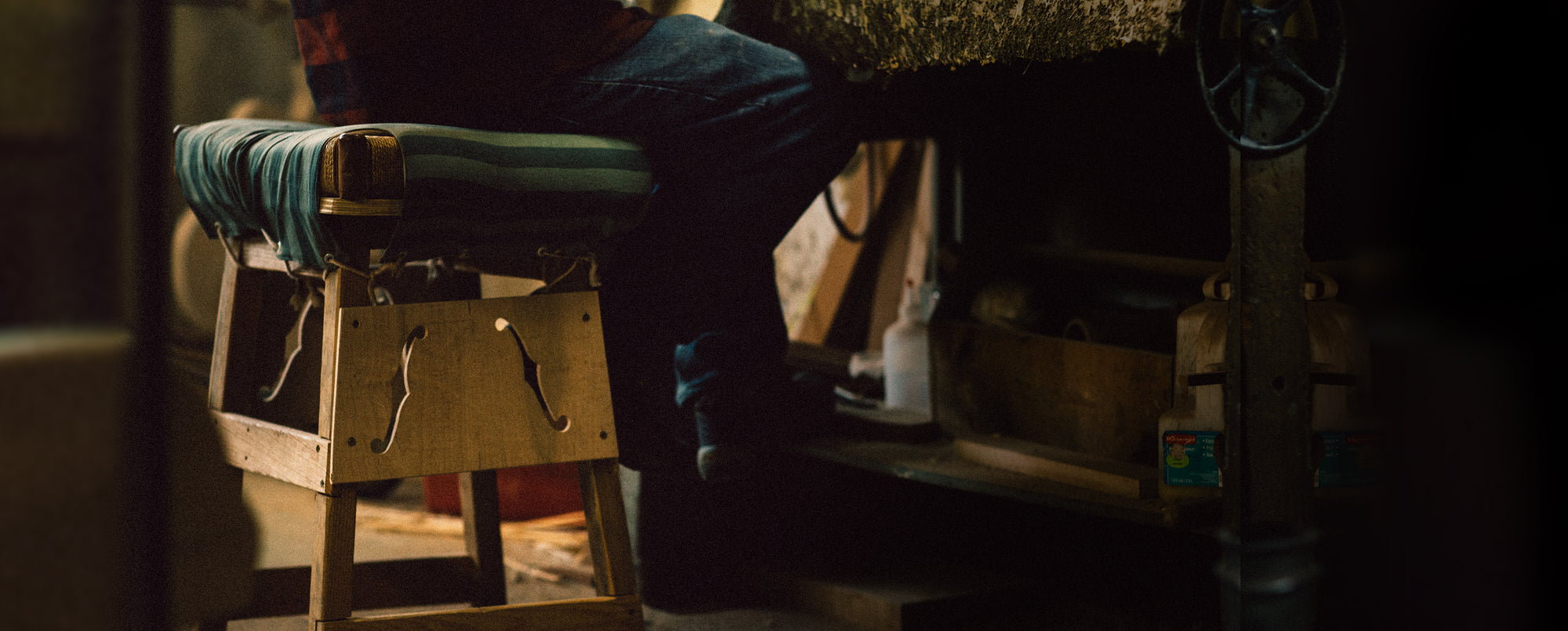 A man sitting on a stool